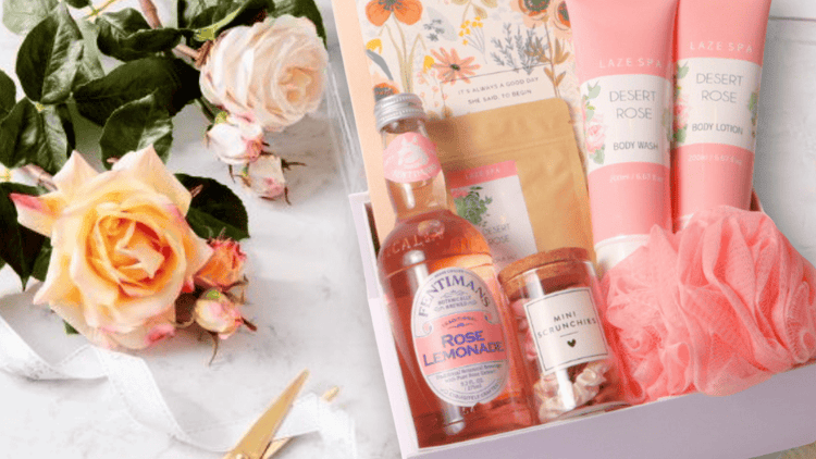 Collection of gifts for her featuring spa gift baskets, self care and indulgent snacks