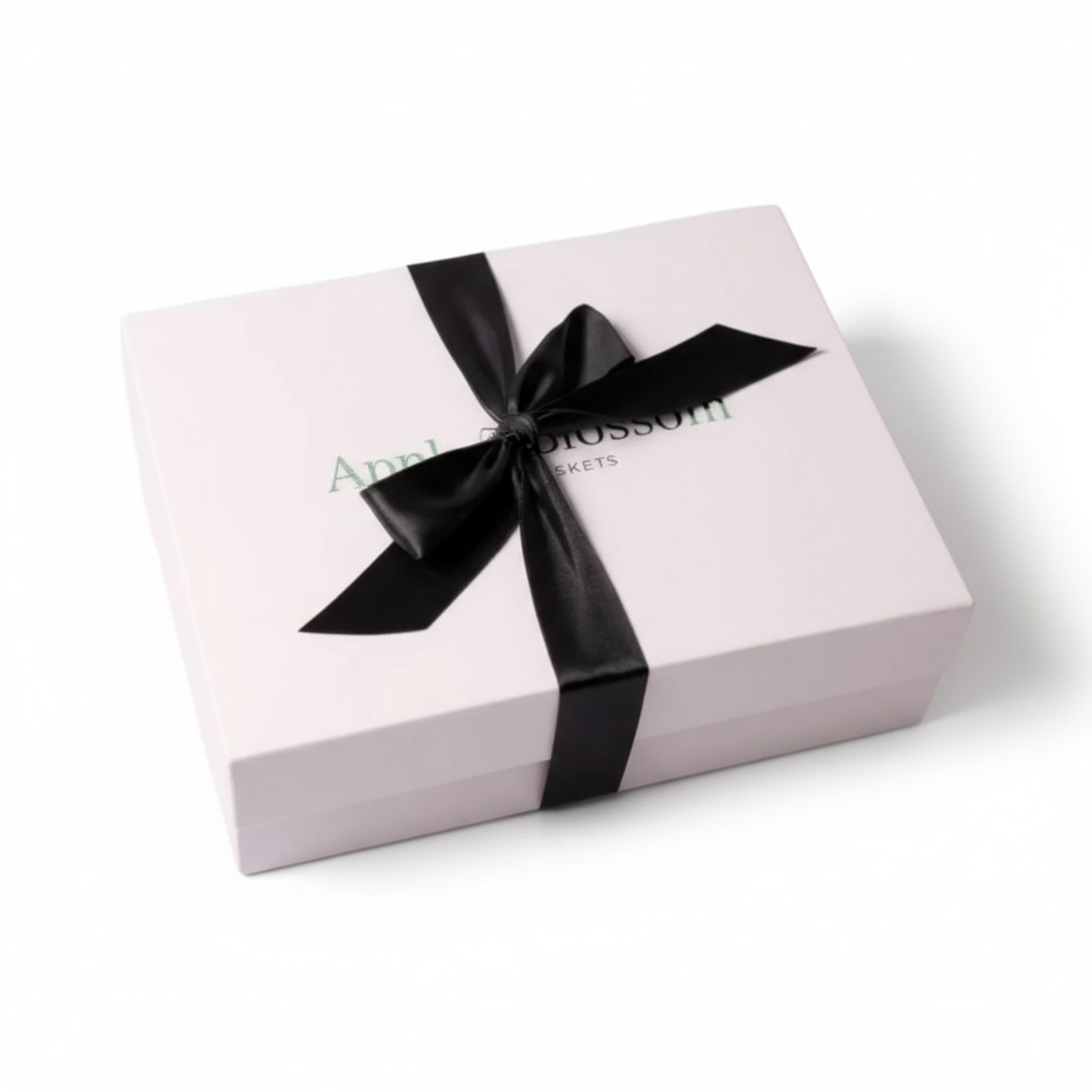 white apple blossom gift baskets signature luxe gift box with a satin red bow.