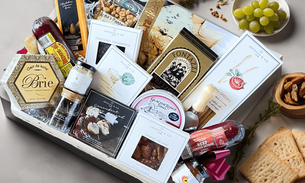 gift basket filled with charcuterie items like smoked sausage, salami, cheese, crackers, nuts, and more snacks made in Washington