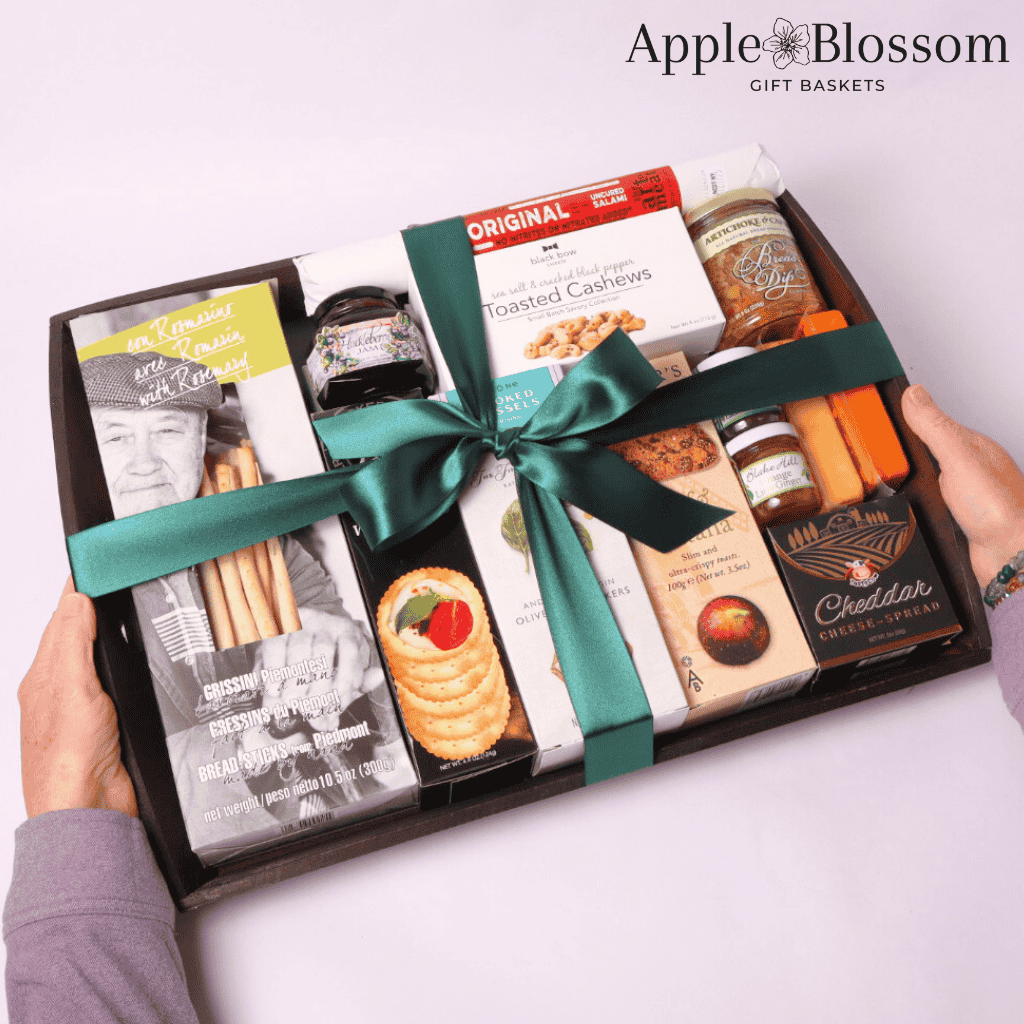 Unique wooden gift tray filled with gourmet charcuterie snacks like smoked cheese, artisan salami, and artichoke caper dip—a unique corporate or client gift showcasing Washington-made products.