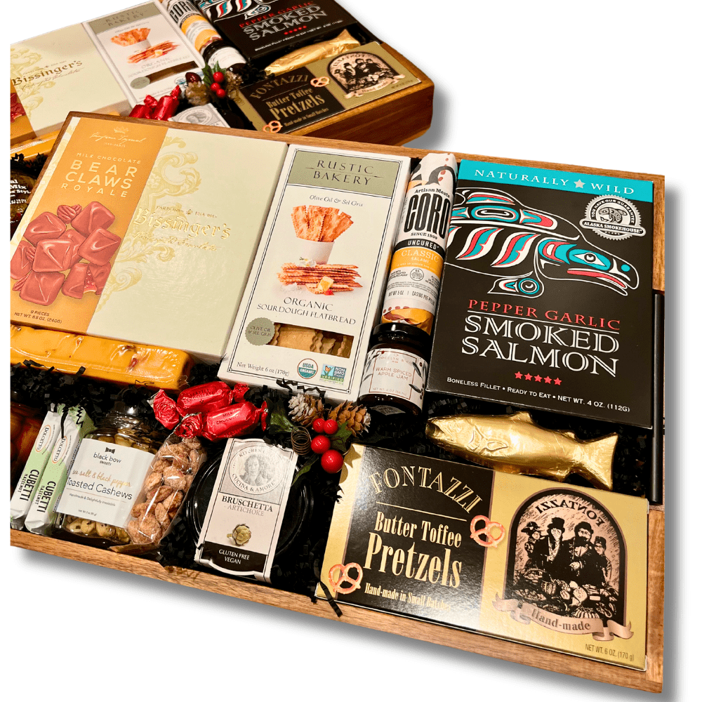 made in Washington charcuterie gift snack tray for the office. Includes: smoked salmon, pretzels, candied nuts, bear claws, salami, crackers and snacks