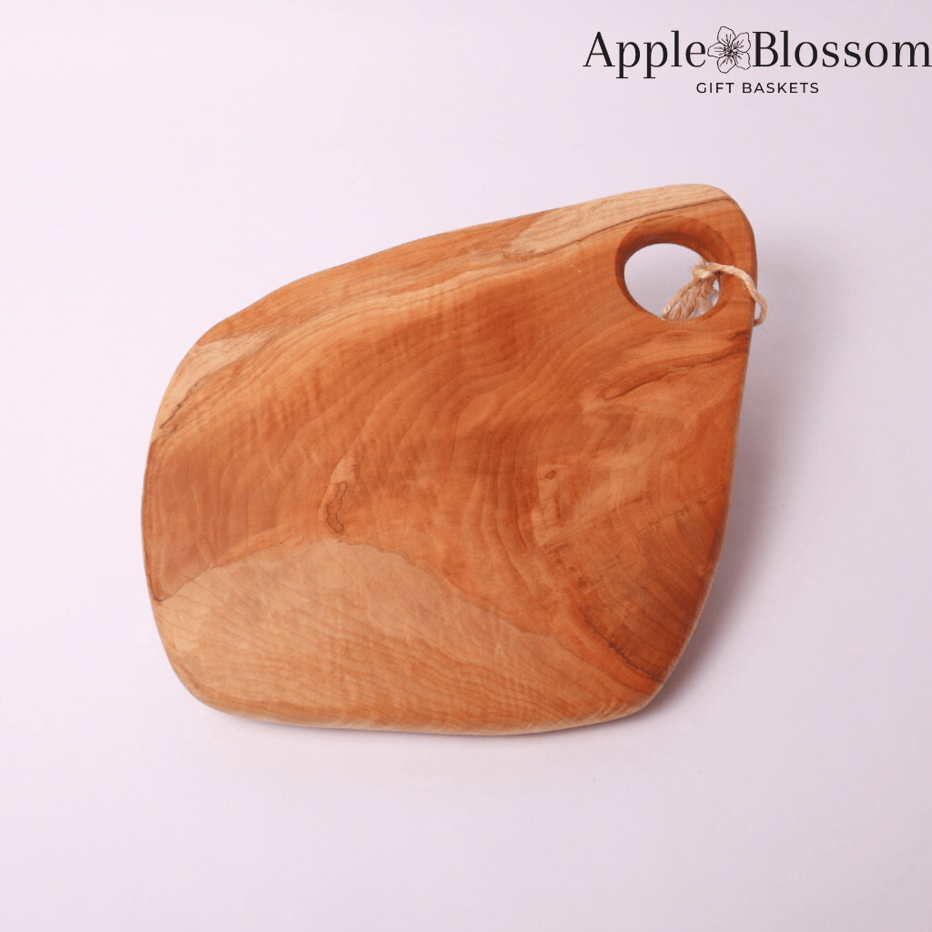 Rustic wooden charcuterie board, handmade in Washington from locally salvaged logs, perfect for serving artisan cheeses, meats, and snacks.