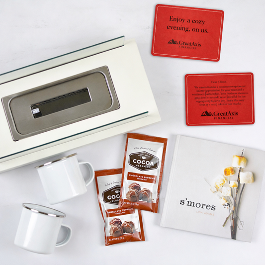 Top down view of Seattle Client Appreciation gift box with s’mores maker and branded message card