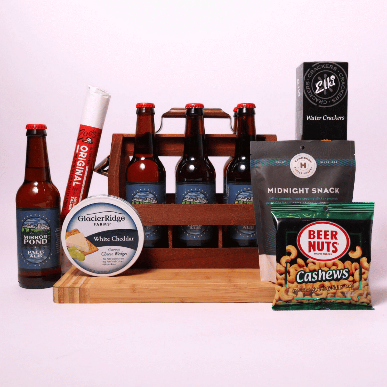 beer and snack crate showing a wooden 6 beer bottle crate with opener, meat stick, cheese wheel, beer nuts and snack mix gifts for him