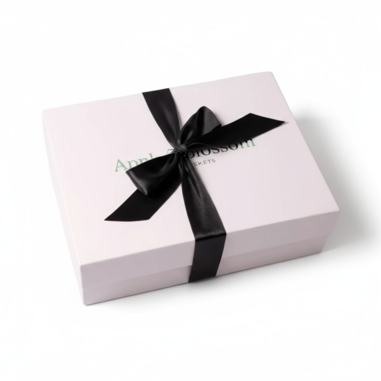 white apple blossom gift baskets signature luxe gift box with a satin red bow.