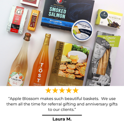 Non-Alcoholic Wine Basket with 5 star review that says “Apple Blossom makes such beautiful baskets.  We use them all the time for referral gifting and anniversary gifts to our clients