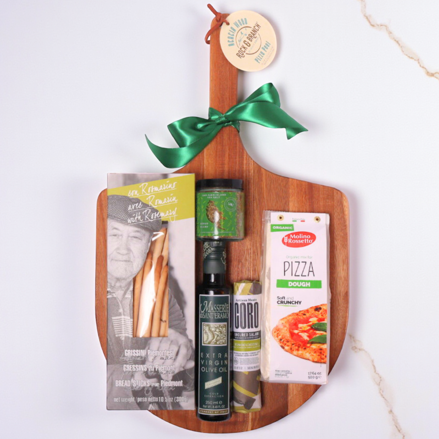 pizza night family gift set with pizza peel, olive oil, crackers, pizza dough, seasoning and salami