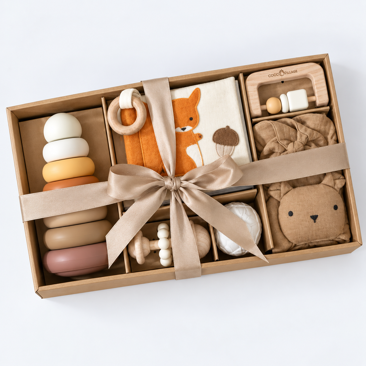 modern baby gift set with wooden rattle, silicone stacker, soft book and blanket