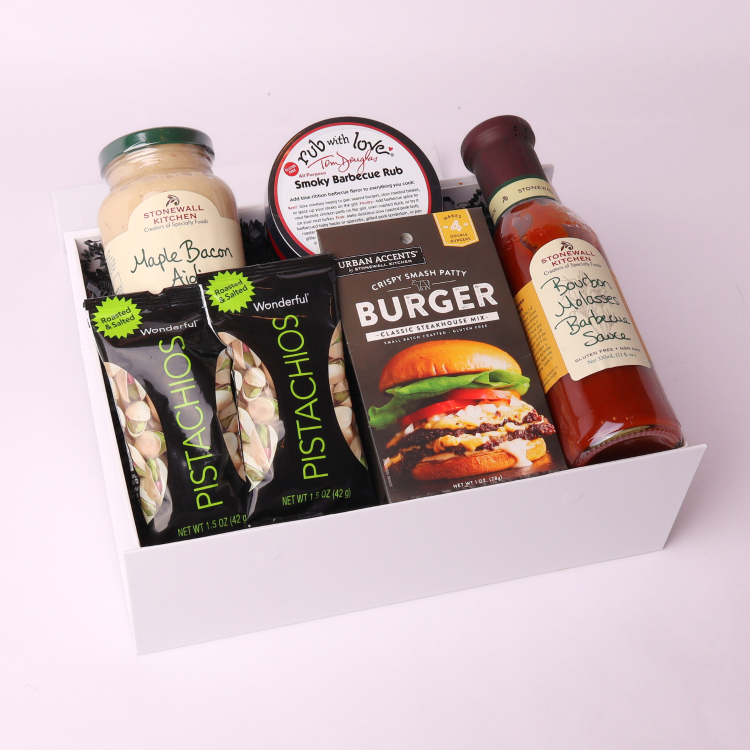 Summer BBQ gift box filled with gourmet sauces, snacks, and Tom Douglas Rub with Love seasoning made in Seattle.