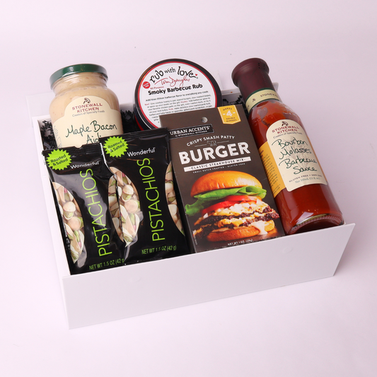 Summer BBQ gift box filled with gourmet sauces, snacks, and Tom Douglas Rub with Love seasoning made in Seattle.