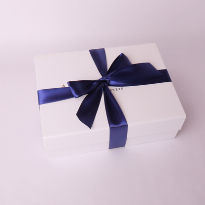 Summer BBQ gift basket with white box and navy ribbon, perfect for Father's Day or corporate gifting.