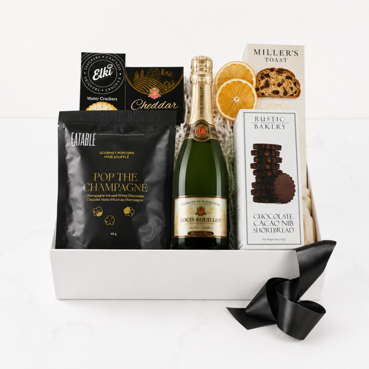 champagne gift basket with pop the champagne popcorn and celebration themed snacks made in WA