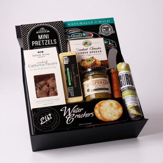 Charcuterie gift box made in WA, featuring gourmet meats, cheeses, nuts, and tapenade. Perfect for corporate gifting, holiday events, or client appreciation. A delicious taste of Seattle in a beautifully assembled box.