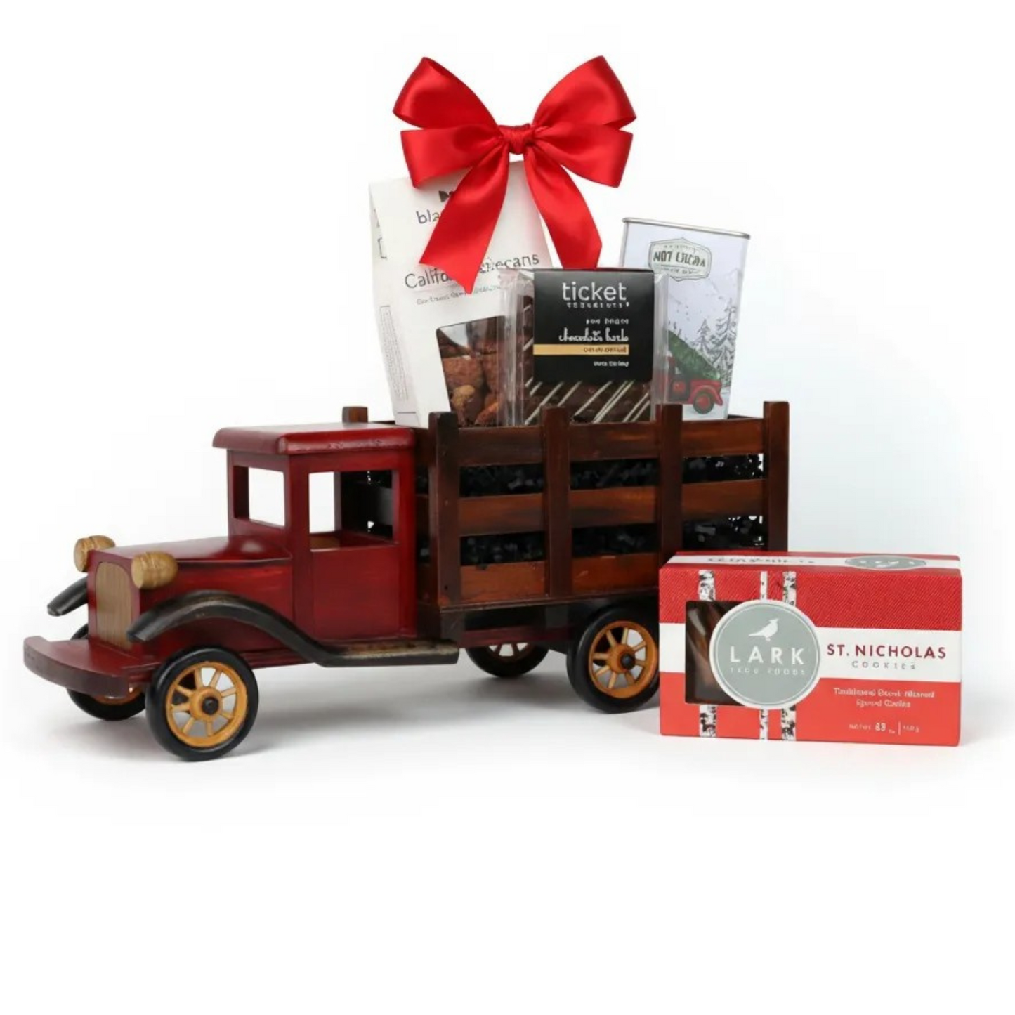 Vintage wooden truck gift basket filled with cookies and chocolates, tied with a red satin bow