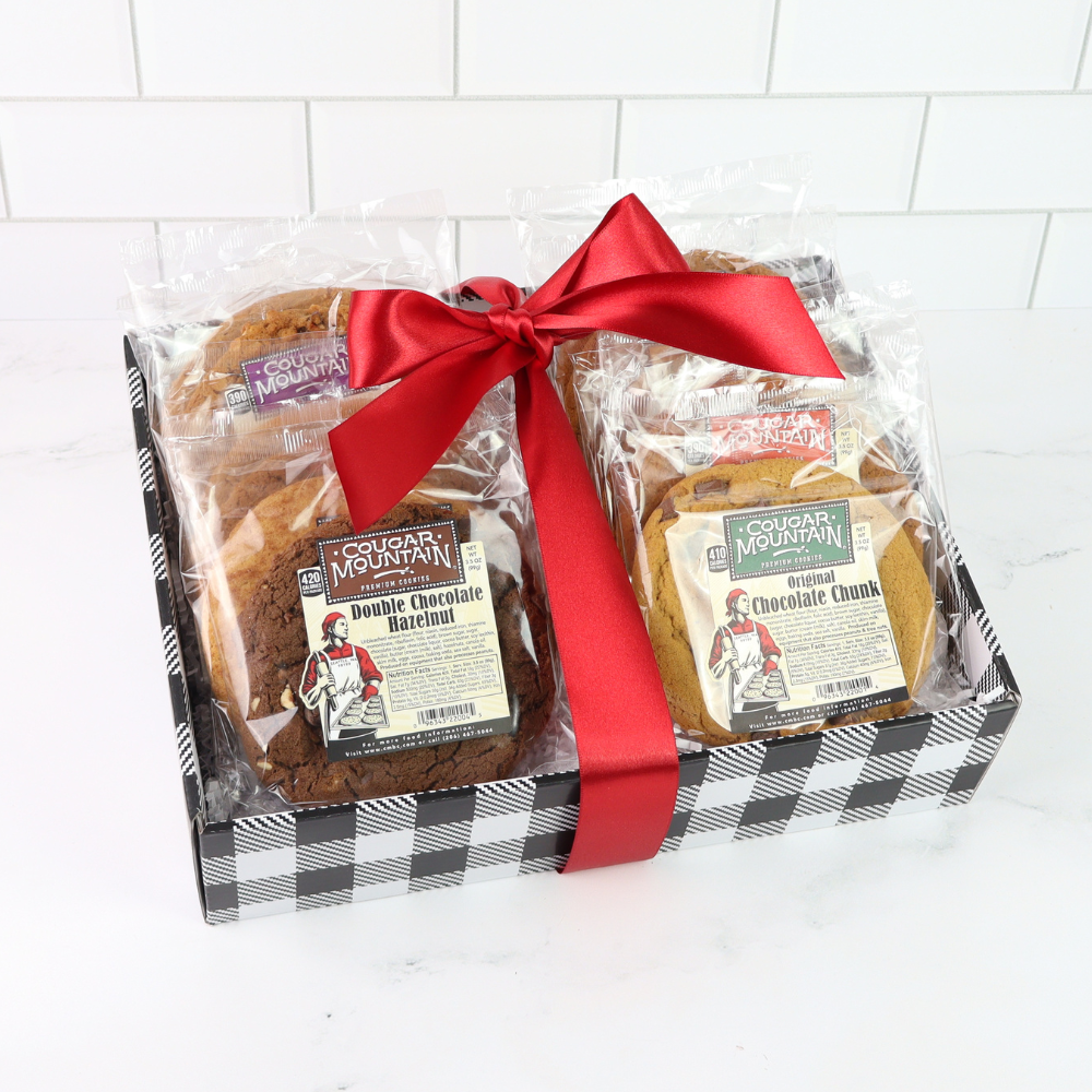 A delicious gift box of Cougar Mountain Cookies made in WA, perfect for a family or office to share. Includes flavors like Chocolate Chunk and Oatmeal Raisin. Ideal corporate gift, real estate closing gift, or team celebration. Delivery available