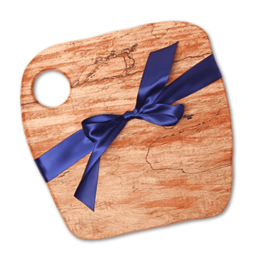 Handcrafted charcuterie board made in Washington, milled and kiln-dried from salvaged Snoqualmie Valley logs, finished with food-safe oil and wax.