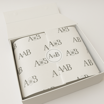 Day At The Spa Gift Basket Interior view of gift box sealed with custom Apple Blossom printed closure paper for an elevated unboxing experience.