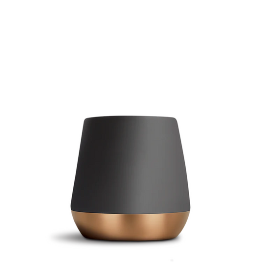 Black and copper ceramic mug on a white background