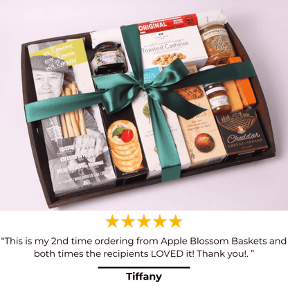 For the Host gift basket presented in a wooden reusable tray with caulk board insert.  The gift tray includes: grissini, water crackers, basil crisps, fig toast, cheese dip, toasted cashews, huckleberry jam, cheese, smoked muscles, jams and uncured salami.