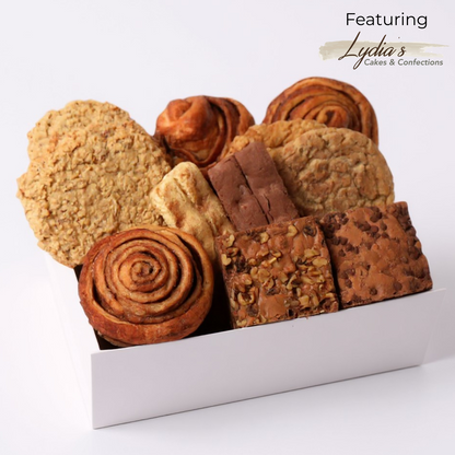 Gourmet Bakery Gift Box from the Pacific Northwest – A delicious assortment of freshly baked cookies, brownies, biscotti, and cinnamon rolls, handcrafted in Maple Valley, WA—perfect for a Seattle dessert gift, local foodie gift, or corporate gifting.