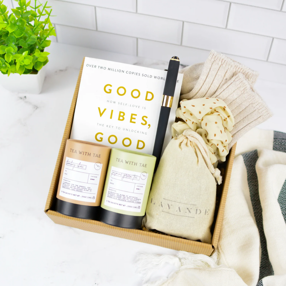 Good Vibes Self-Care Gift Box with book, tea, cozy socks, lavender sachet, silk scrunchie, and luxury pen
