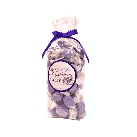 8oz bag of purple huckleberry saltwater taffy with a purple bow