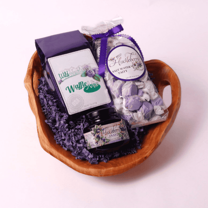 Luxury Washington Huckleberry Gourmet Gift Basket – A one-of-a-kind gift featuring a handcrafted wooden bowl filled with gourmet huckleberry treats. Ideal for food lovers, corporate gifting, and special occasions.