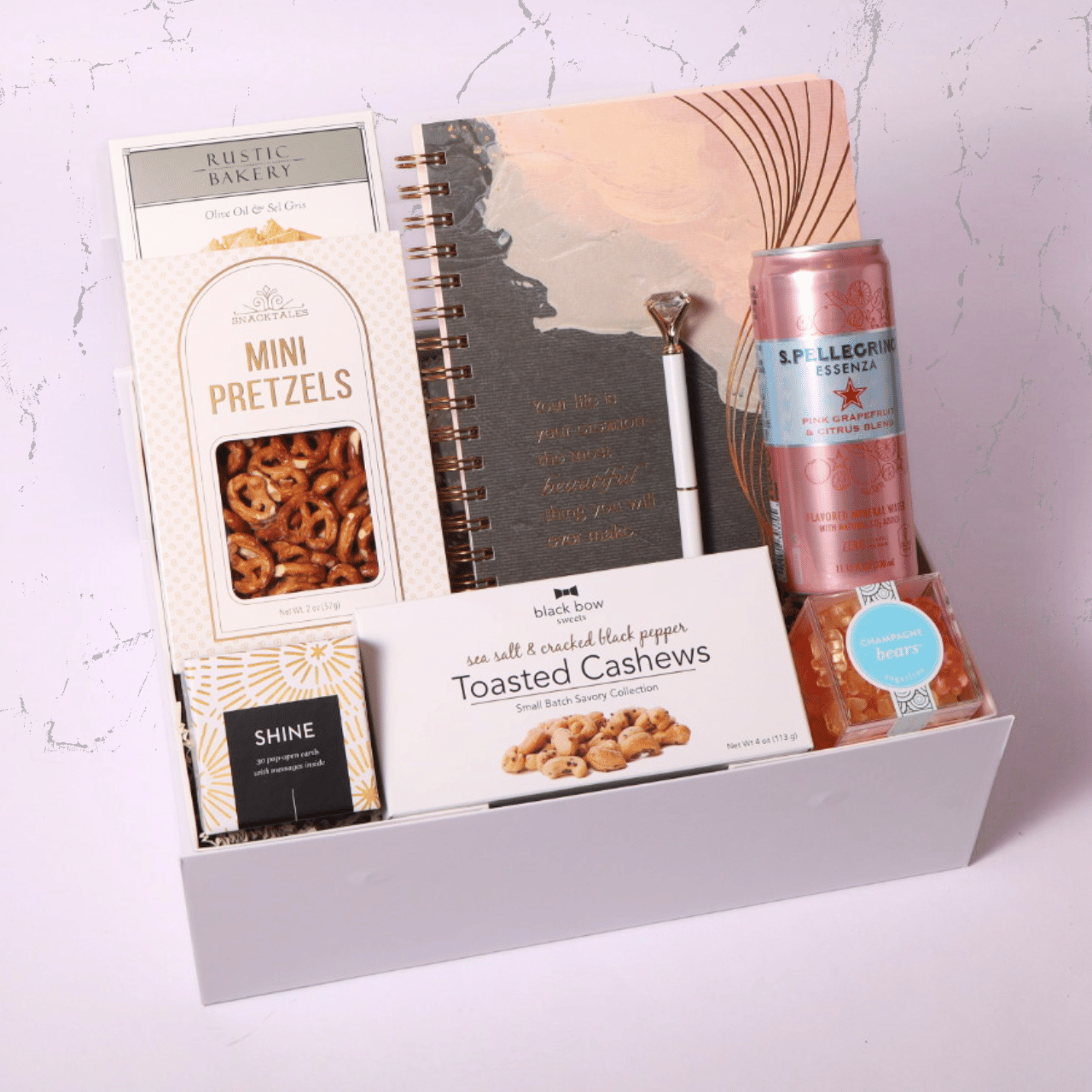 Inspirational gift box with notebook, snacks, and uplifting messages, perfect for encouragement, motivation, or a thoughtful birthday gift.