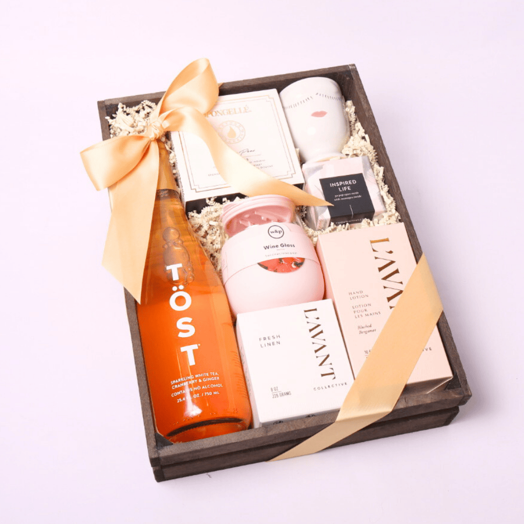 A beautifully arranged pamper her gift box with premium spa essentials, perfect for birthdays, get well soon gifts, or a luxurious self-care treat.