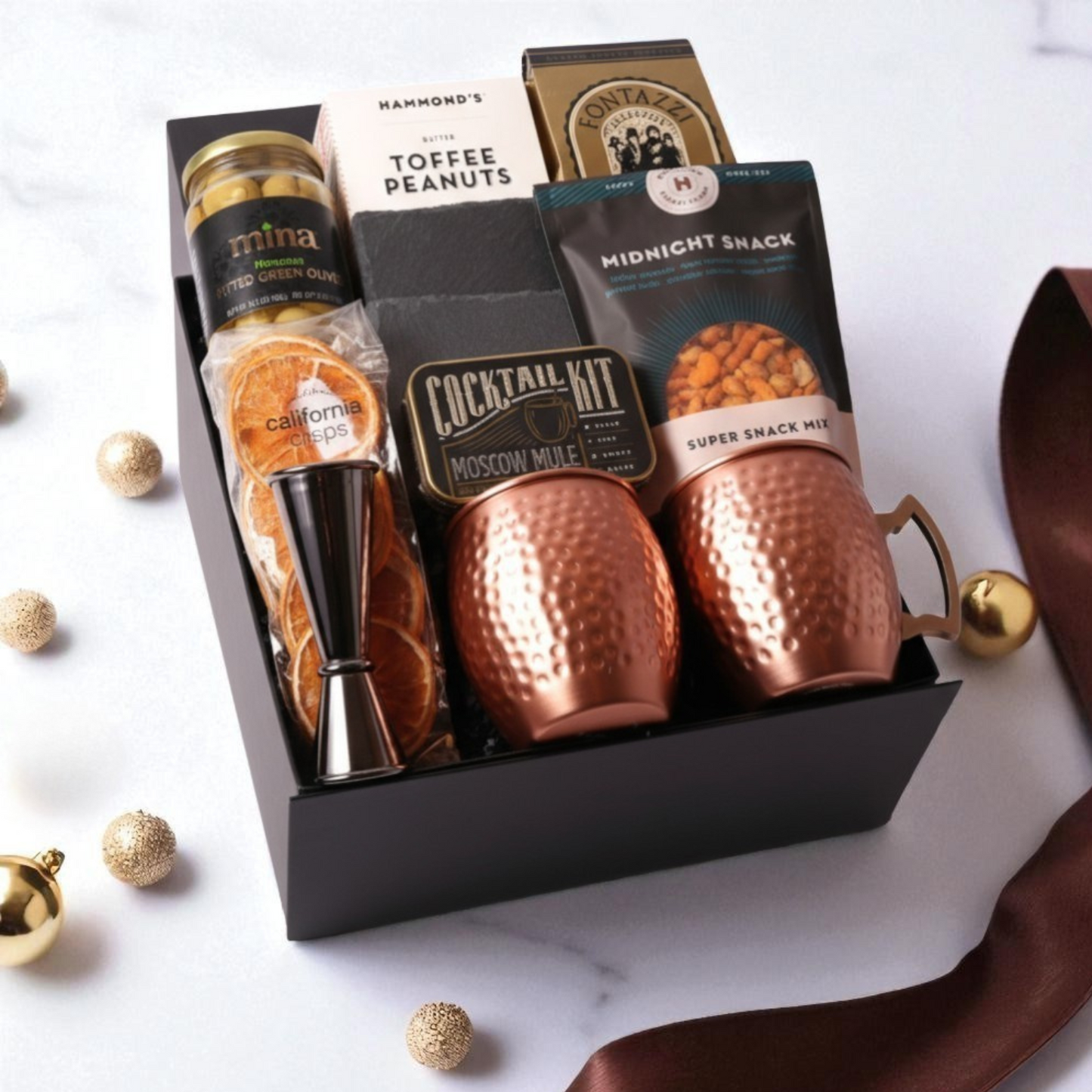 moscow mule christmas gift box with copper mugs, cocktail mixer kit, slate coaters and snacks.  holiday client gift