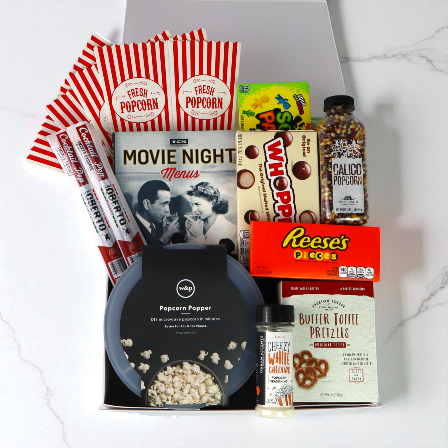 Luxury movie night gift basket for couples or families, crafted in the Pacific Northwest and filled with locally sourced treats and popcorn.
