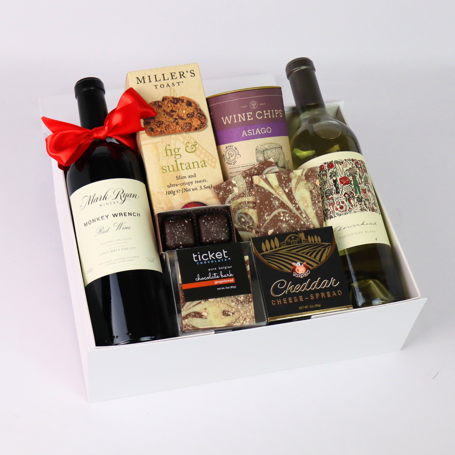 Pacific Northwest Elegance wine gift box featuring Columbia valley Mark Ryan wine, wine chips, cheese, crackers, and chocolates.