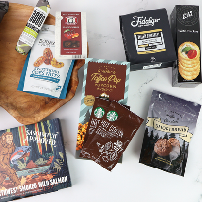 Assorted washington made products including snacks and coffee on a white surface