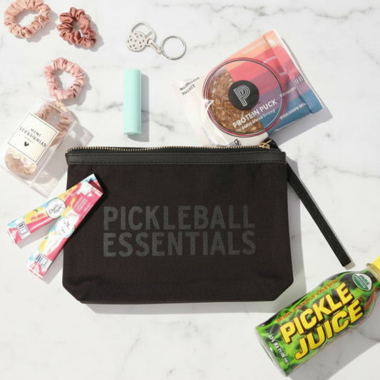 Pickleball Essentials Zipper Pouch, a stylish pickleball gift for her, featuring locally made in Washington accessories like a pickleball paddle keychain, energy bar, and lip balm. Perfect for any pickleball enthusiast!