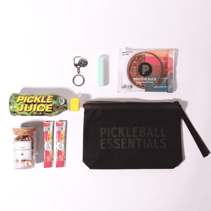 Celebrate the pickleball lover in your life with this thoughtful pickleball gift for her, including a convenient zipper pouch filled with essentials made in WA, such as drink mixers and scrunchies for on-the-go play.