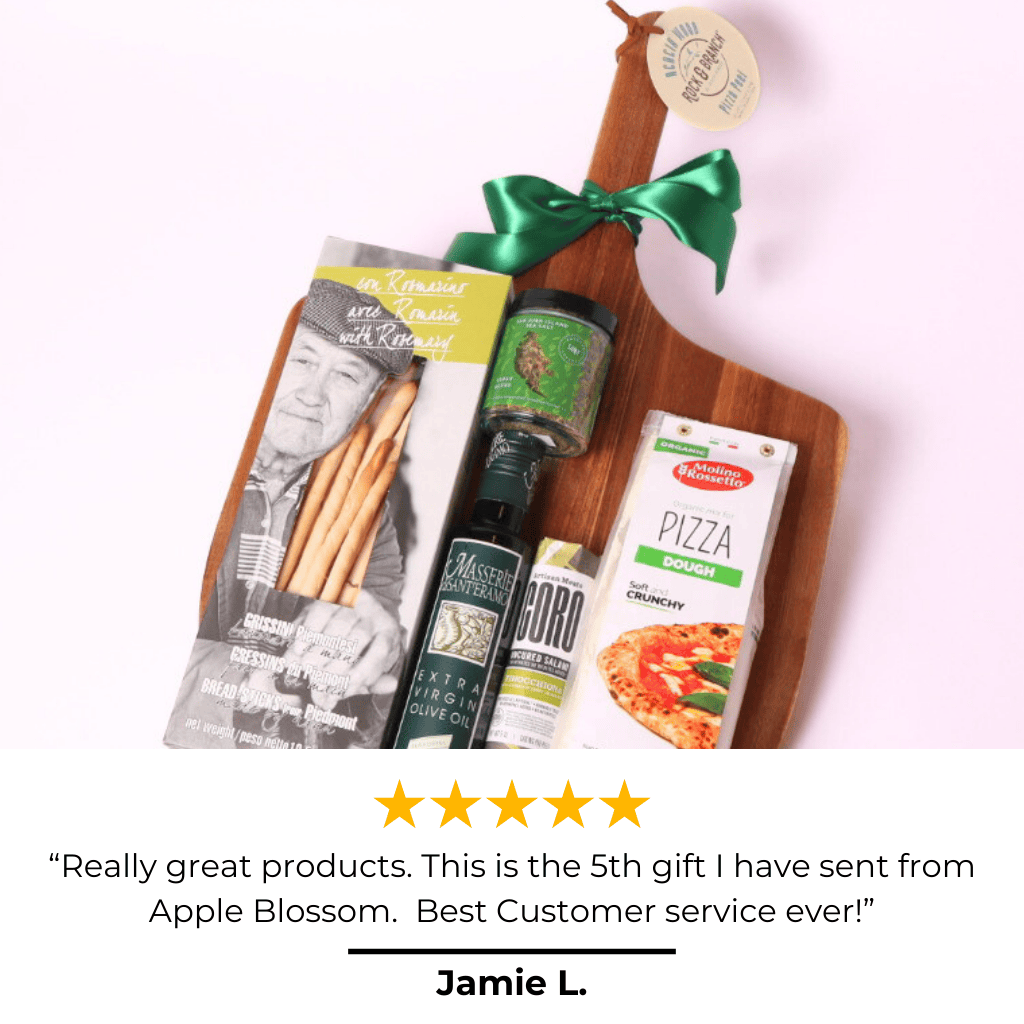 A top-rated pizza night gift basket displayed on a handcrafted pizza peel, filled with artisanal Italian ingredients—an elegant broker closing gift, retirement gift, or personalized thank-you present.