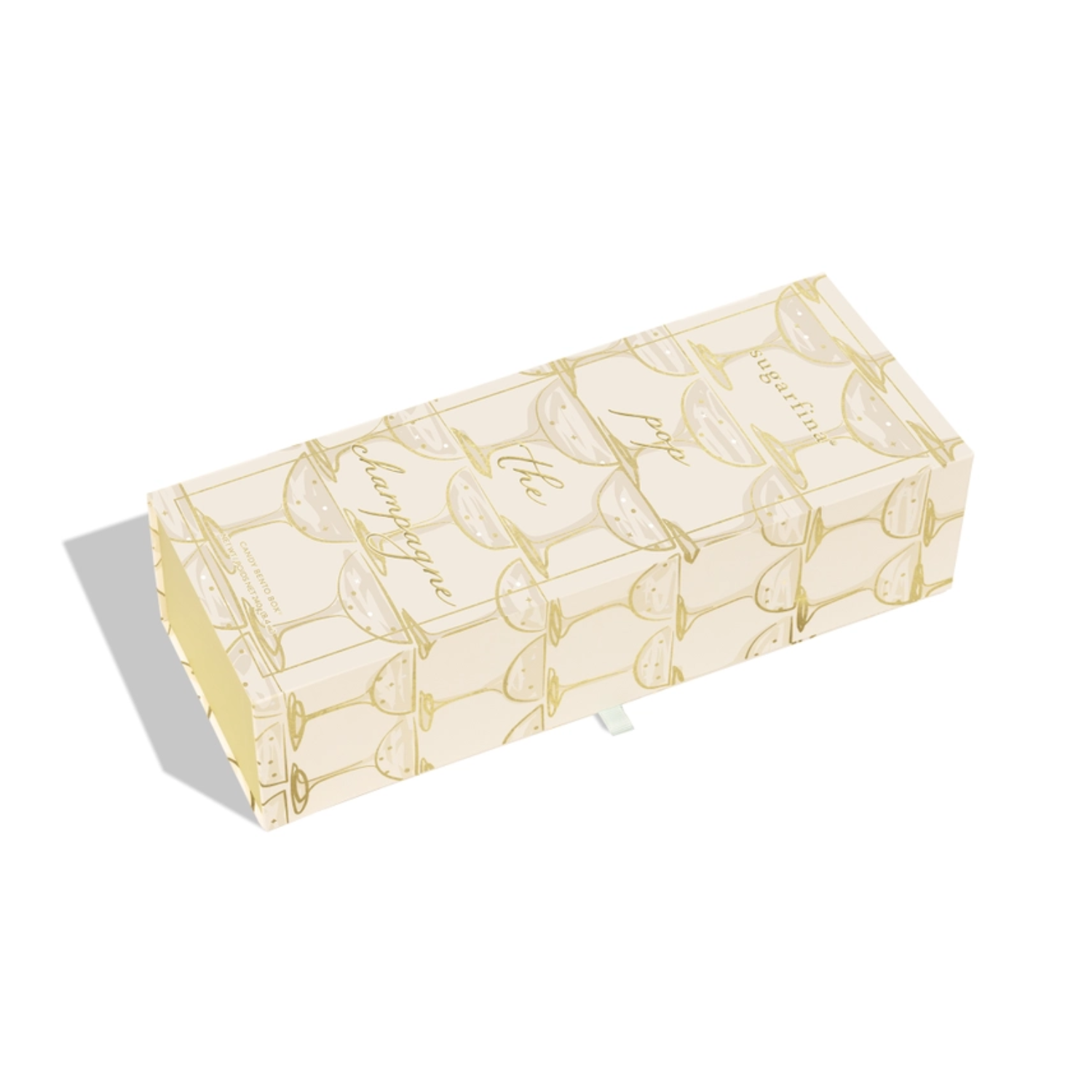 Elegant Sugarfina champagne-themed gift box with gold illustrations and script text, shown closed at an angle.