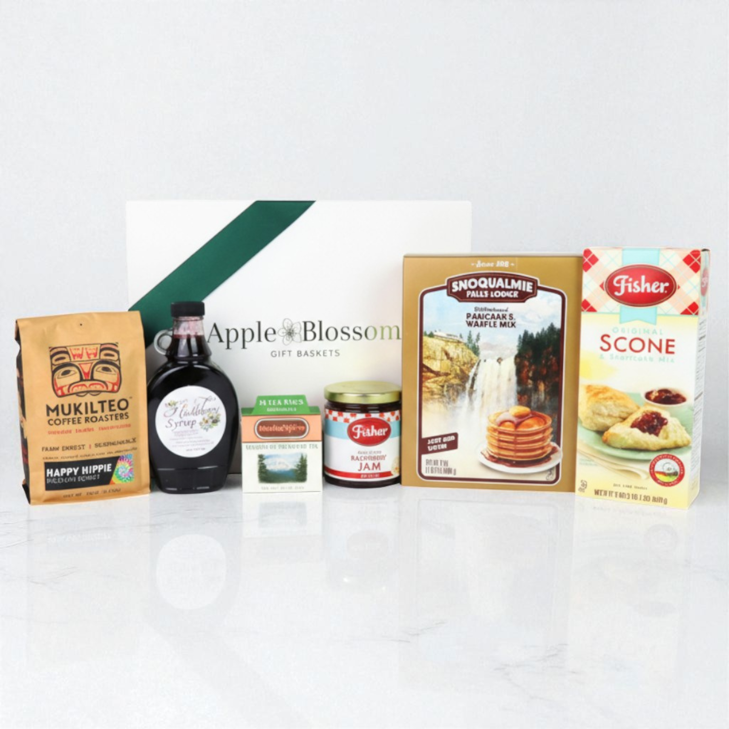 Seattle breakfast gift box with fisher scone mi, fisher raspberry jam, Snoqualmie pancake mix, huckleberry syrup, coffee and northwest tea.