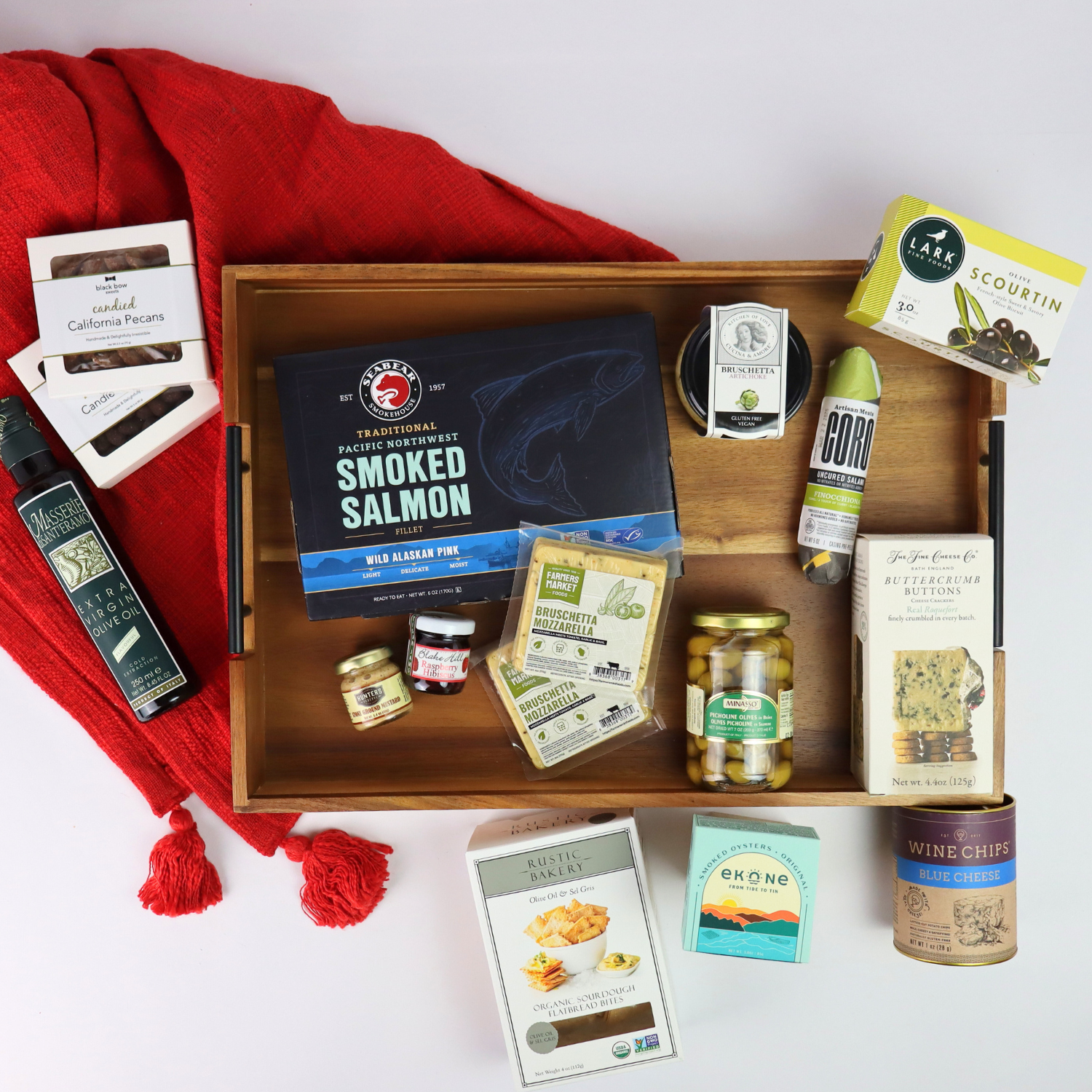 charcuterie made in Washington Christmas snack gift tray.  Holiday tray with crackers, smoked salmon, olives, jam, mustard, nuts, smoked oysters, cheese and biscuits 