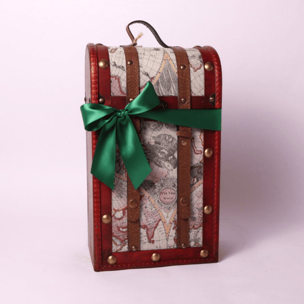 A beautifully curated retirement gift for women, featuring gourmet snacks in a stylish travel-themed chest. Ideal as a retirement gift for men or women who appreciate delicious treats.