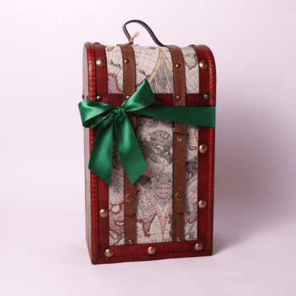 A beautifully curated retirement gift for women, featuring gourmet snacks in a stylish travel-themed chest. Ideal as a retirement gift for men or women who appreciate delicious treats.