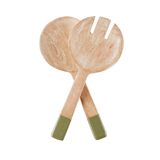 Wooden salad servers with green handles on a white background