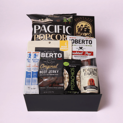 Oberto snack gift box featuring beef jerky, smoked sticks, and truffle popcorn from Washington, a unique treat for the hard-to-buy-for man in your life