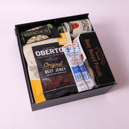 Signature Washington gift box with Oberto snacks, including beef jerky, cocktail pep, pistachios, pretzels, and gourmet popcorn—ideal for corporate or holiday gifting.