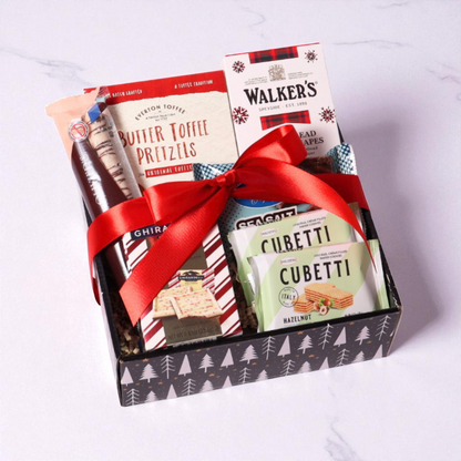 Festive holiday gift tray filled with gourmet treats from local Washington producers, perfect for corporate client gifting.