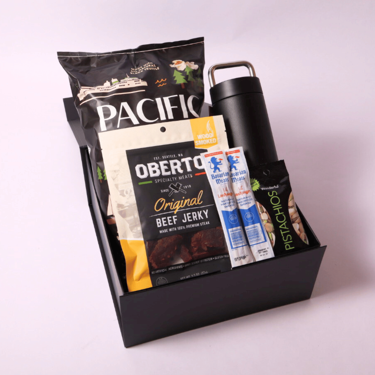 Premium snack and hydrate gift box with a luxury water bottle, beef jerky, smoked beef sticks, pistachios, and truffle popcorn for a unique gift experience