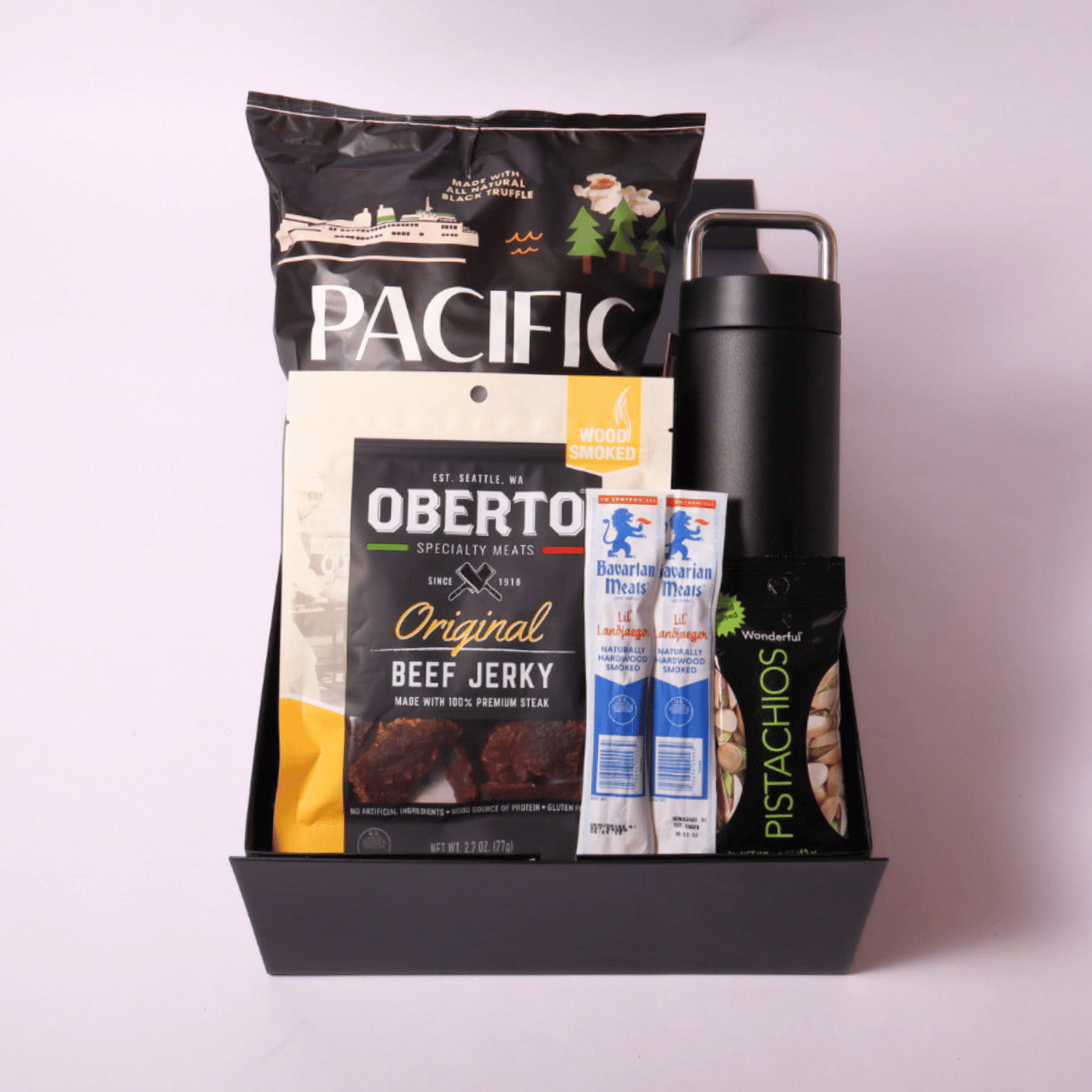Snack and Hydrate Gift Box featuring Fellow 20oz water bottle, gourmet beef jerky, Bavarian smoked sticks, pistachios, and truffle popcorn – perfect for him.