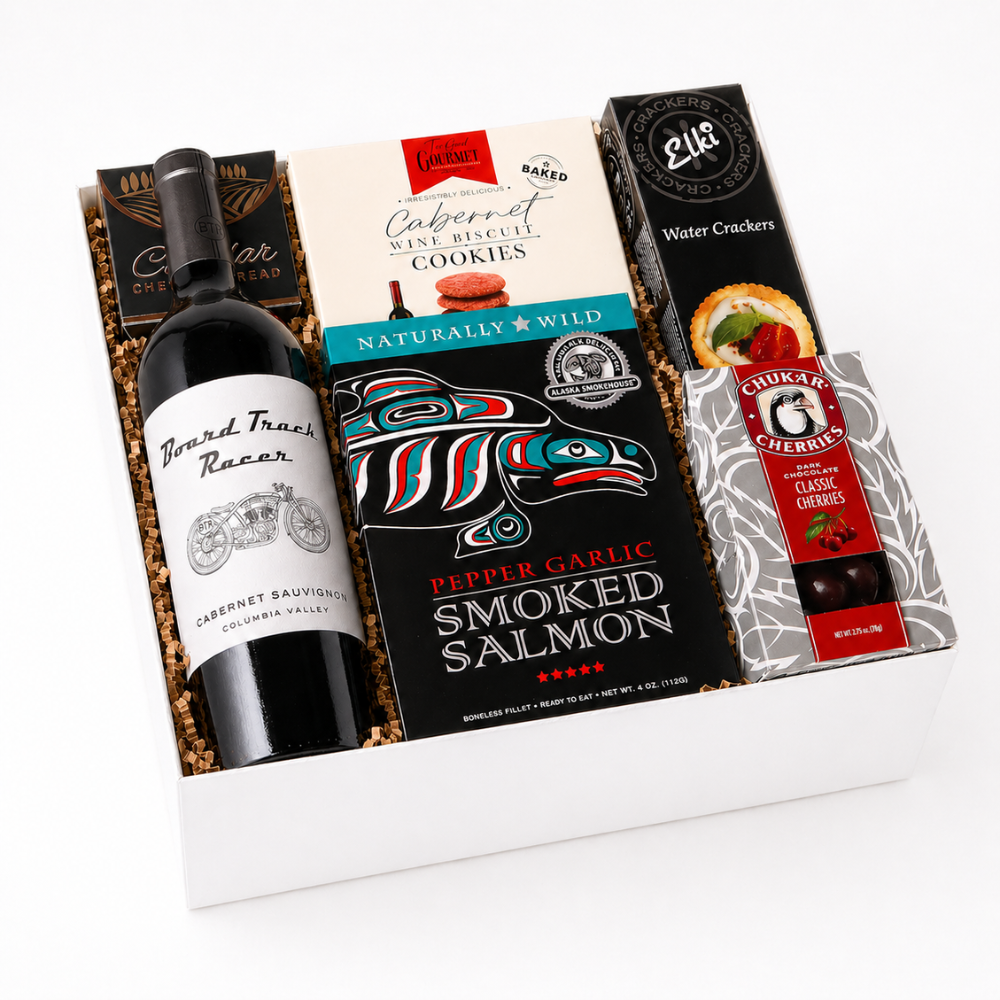 Taste of Washington wine and snack gift box featuring snacks made in the Pacific Northwest.  Mark ryan wine, cheese, crackers, chocolate cherries and smoked salmon.