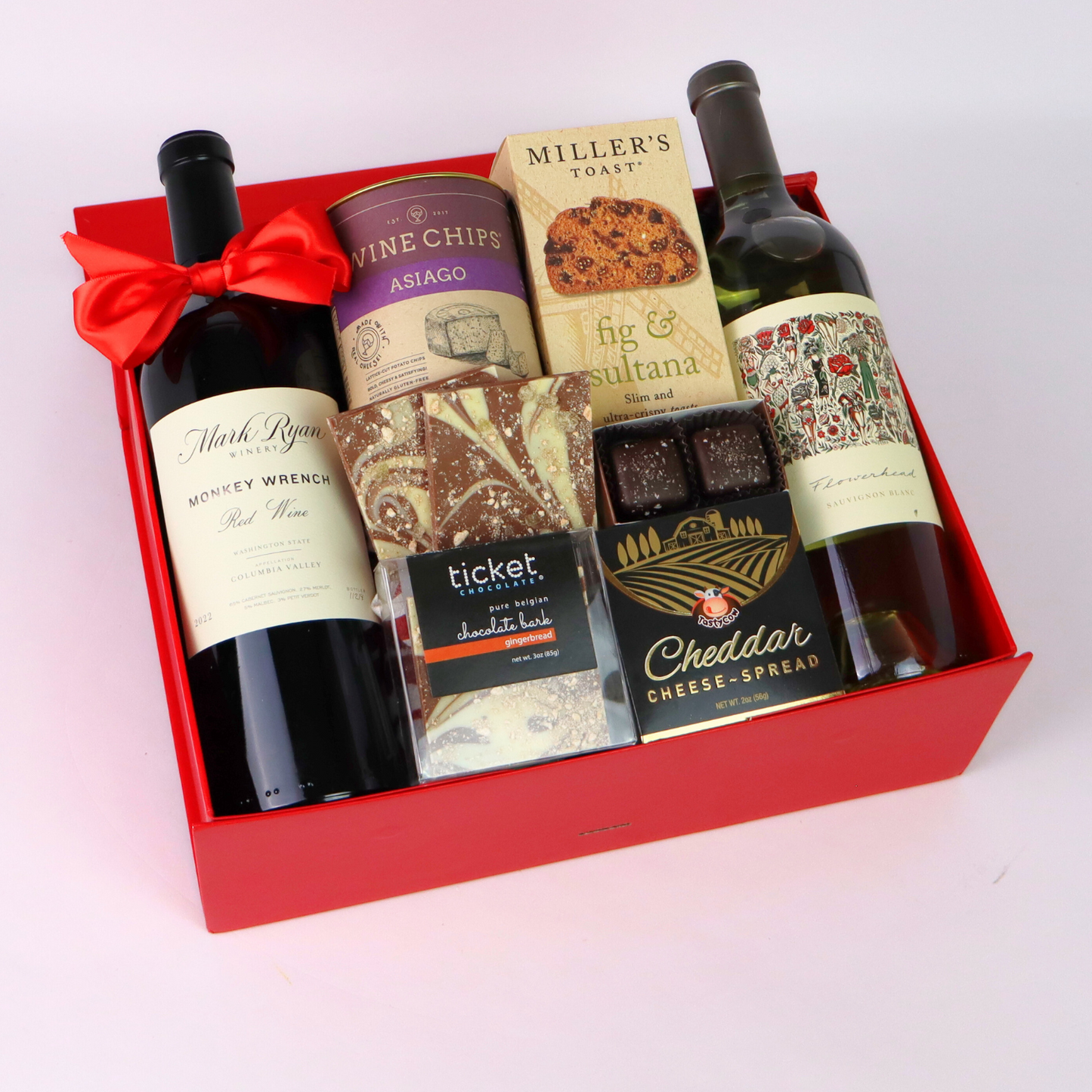 Toast of Washington Wine gift box featuring Columbia valley Mark Ryan wine, wine chips, cheese, crackers, and chocolates.