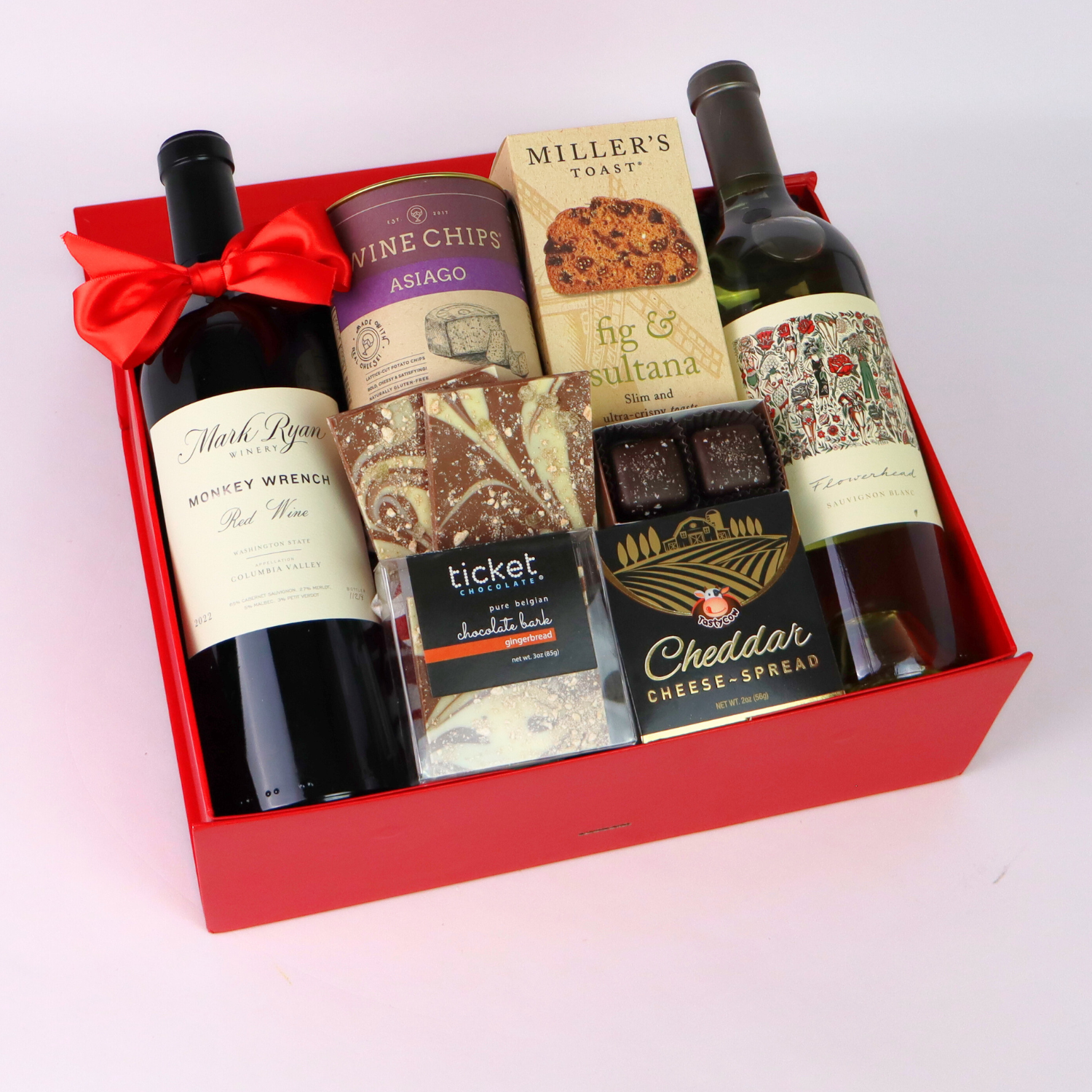 Toast of Washington Wine gift box featuring Columbia valley Mark Ryan wine, wine chips, cheese, crackers, and chocolates.